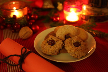 Christmas still-life with candle-light atmosphere and homemade cookies (dark version)