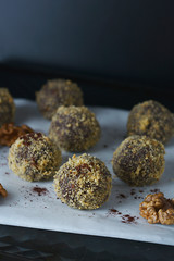 Energy healthy homemade truffles. Uncooked sweet balls made from walnuts and biscuits.