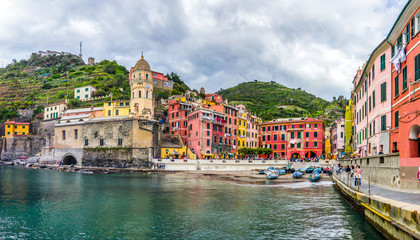 Fototapeta na wymiar beach streets and colorful houses on the hill in Vernazza in Cinque Terre in Italy 