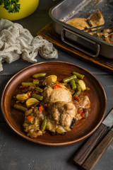 Prepared for baking chicken meat with vegetables.