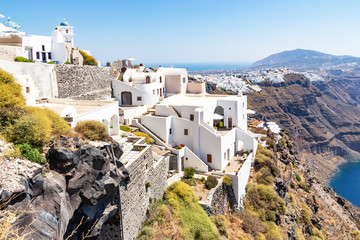 Views of houses that are built against the cliff in Fira, Santorini, Greece