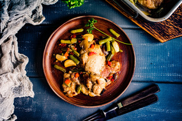 Prepared for baking chicken meat with vegetables.