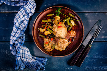 Prepared for baking chicken meat with vegetables.