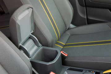 Open storage box between front car seats