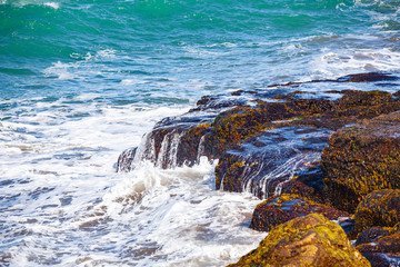 waves of the Atlantic Ocean crashing against the rocks