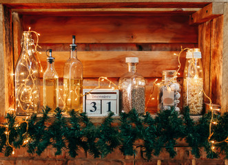 Wooden kitchen shelf with the infusion of the new year