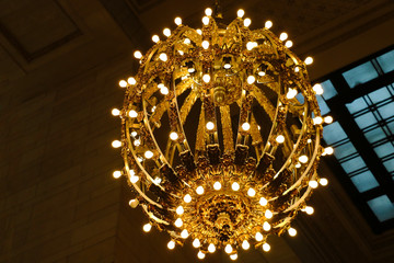 NEW YORK - AUGUST 26, 2018: Chandelier on the ceiling of Grand Central Station.