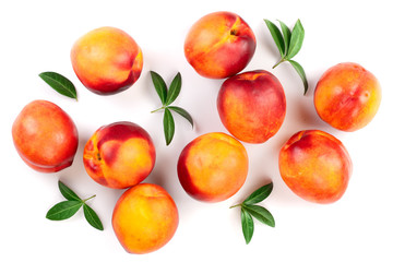 ripe nectarine with leaves isolated on white background. Top view. Flat lay pattern