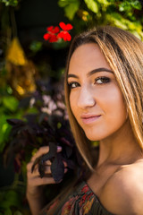 Photographing a girl during autumn with a blurred background