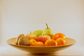 fruit bowl with different fruits isolated