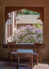 Lilacs through the archway