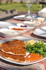 Traditional Cypriot meze and kebap barbecue party in the garden with delicious mix meat and chicken kebaps