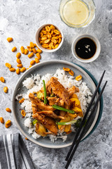 Kung Pao chicken, stir-fried Chinese sichuan traditional sichuan  dish with chicken, peanuts, vegetables and chili peppers.