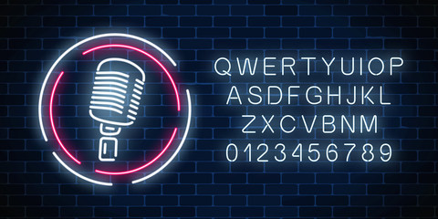 Neon signboard with microphone in round frame with alphabet. Nightclub with live music icon.