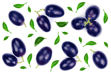 blue grapes with leaves isolated on the white background. Top view. Flat lay pattern
