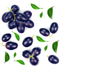 bue grapes wih leaves isolated on the white background with copy space for your text. Top view. Flat lay pattern