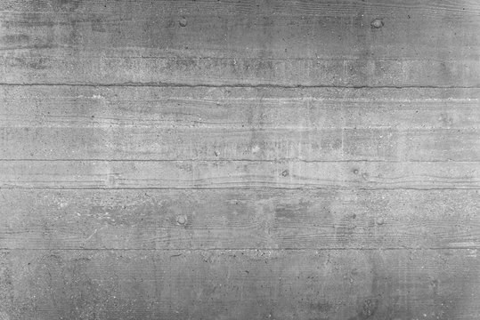 Rustic scratched concrete wall texture background.
