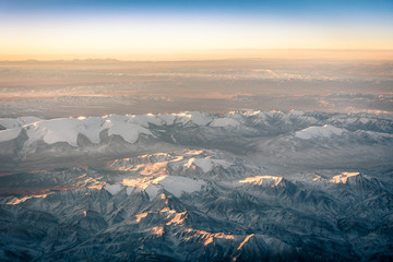 Dawn over the Gobi Desert seen from the airplane, Mongolia
