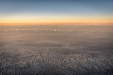Dawn over the Gobi Desert seen from the airplane, Mongolia