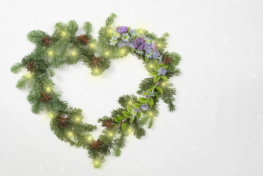 Christmas Wreath In Heart Shape With Flowers