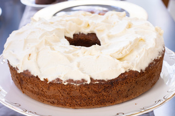 Whipped cream cake with fresh cream topping