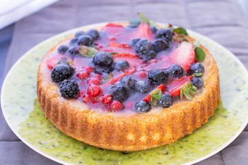 Cake with cranberry, strawberry, blueberry and blackberry