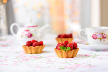 Mini tarts with raspberries fruits