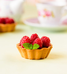 Mini tart with raspberries fruits