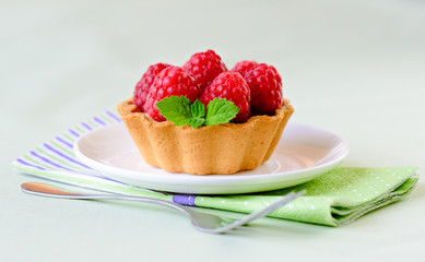 Mini tart with raspberries fruits