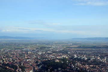 Fototapeta premium Aerial view of the Brasov City from Tampa Mount. Brasov, Transylvania, Romania.