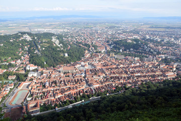 Fototapeta premium Aerial view of the Brasov Old town from Tampa Mount. Brasov, Transylvania, Romania.