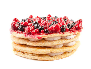 cake with fresh berries isolated on white background