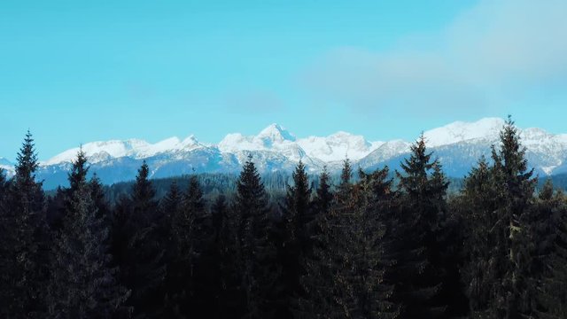 Reveling aerial shot of Slovenia highest mountain Triglav in winter time. 