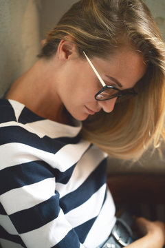 Portrait of a beautiful girl having a coffee break in a wonderful coffee house. Relax leisure concept