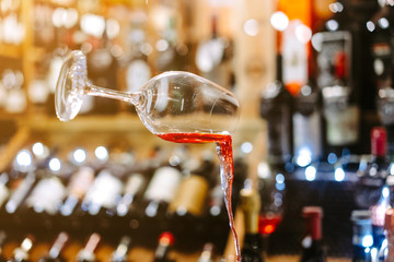 Glass of Wine Falling Mid Air with Spill