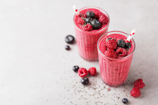 Healthy appetizing red smoothie dessert in glasses