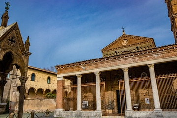 The church, the bell tower, and the liturgical fountain 