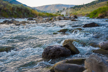 Landscape scene of  the Gardner River and distant mountains near the north entrance of Yellowstone National Park