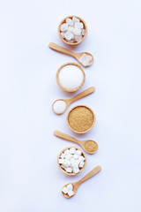 Various types of sugar on white