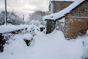 drifting snow outside house in lincolnshire