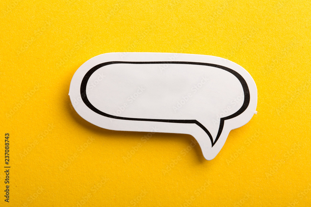 Wall mural speech bubble isolated on yellow background