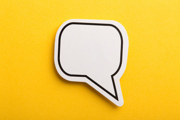 Speech Bubble Isolated On Yellow Background