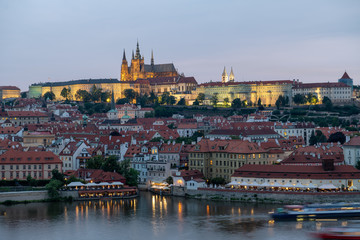 Obraz premium Prague, Czech Republic. Charles Bridge and Hradcany (Prague Castle) with St. Vitus Cathedral and St. George church evening dusk, Bohemia landmark in Praha.