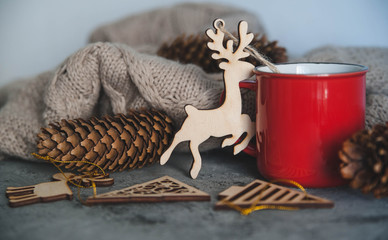 Wooden deer on stone background.
