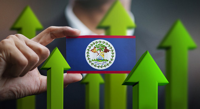 Nation Growth Concept, Green Up Arrows - Businessman Holding Card of Belize Flag