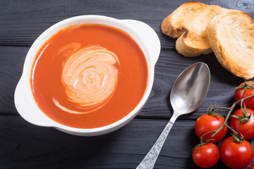 Fresh tomato cream soup in bowl
