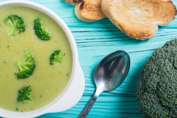 Fresh broccoli cream soup in bowl