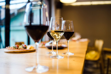 glasses of  wine on a table in restaurant