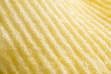 Potato chip texture background closeup