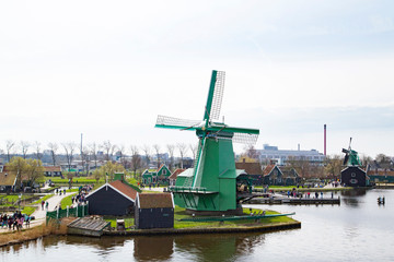 Fototapeta na wymiar Landscape of well-preserved historic windmills and houses